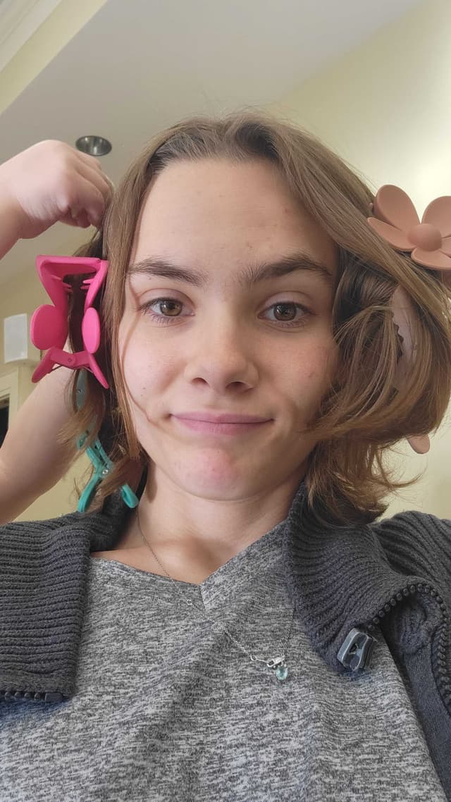 Megan being silly — kids did her hair